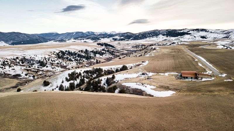 Aerial view over field in Montana Ranch Subdivision