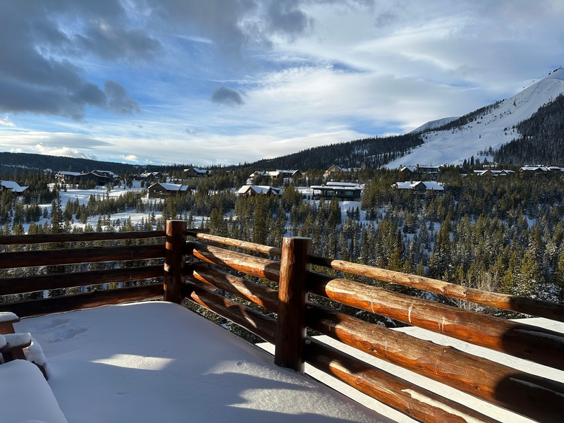 View of the mountains from a chalet porch at Big Sky Resort