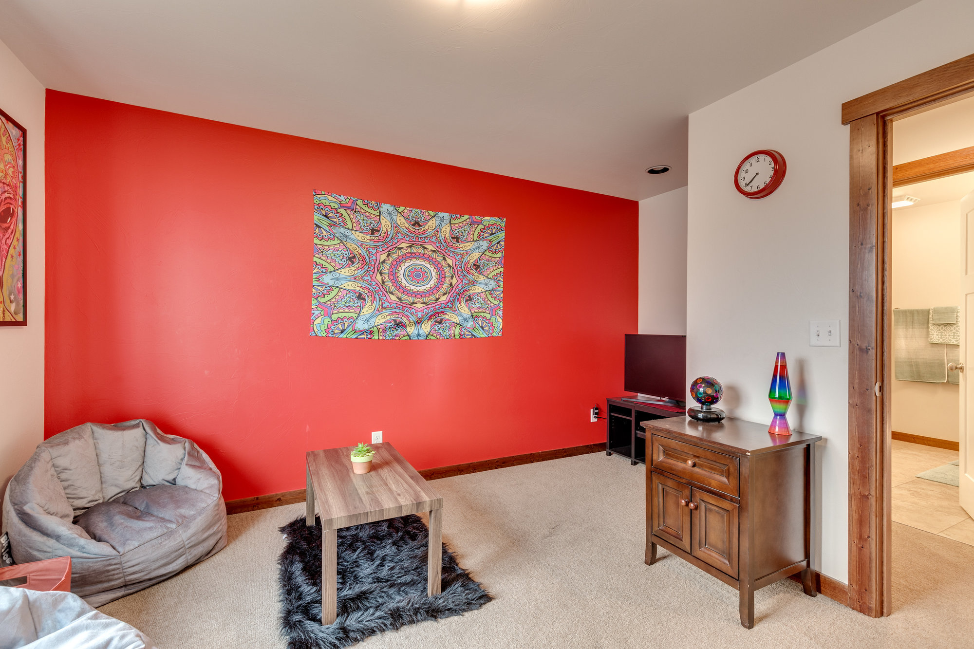 Bright orange accent wall in home