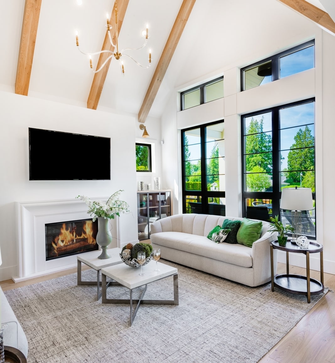 Interior of luxury, modern farmhouse living room with fireplace